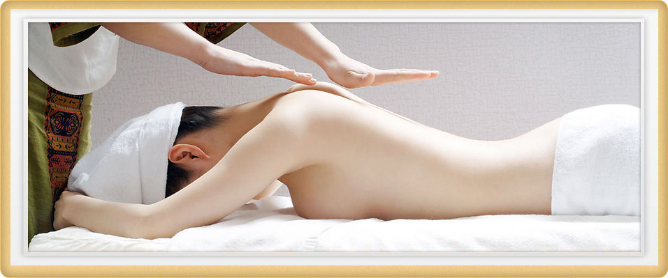 Thai back massage by therapist at Cupid Spa