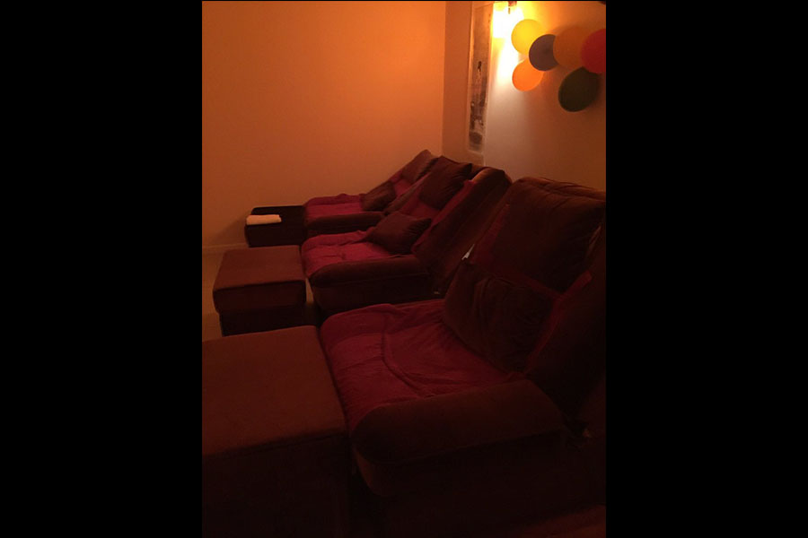Foot massage recliner chairs in couples suite at Cupid Spa